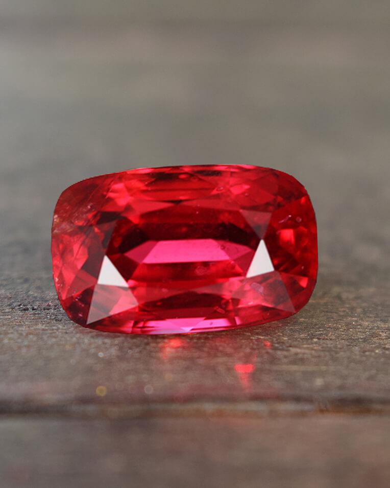 A fine ruby gemstone displaying vivid red saturation