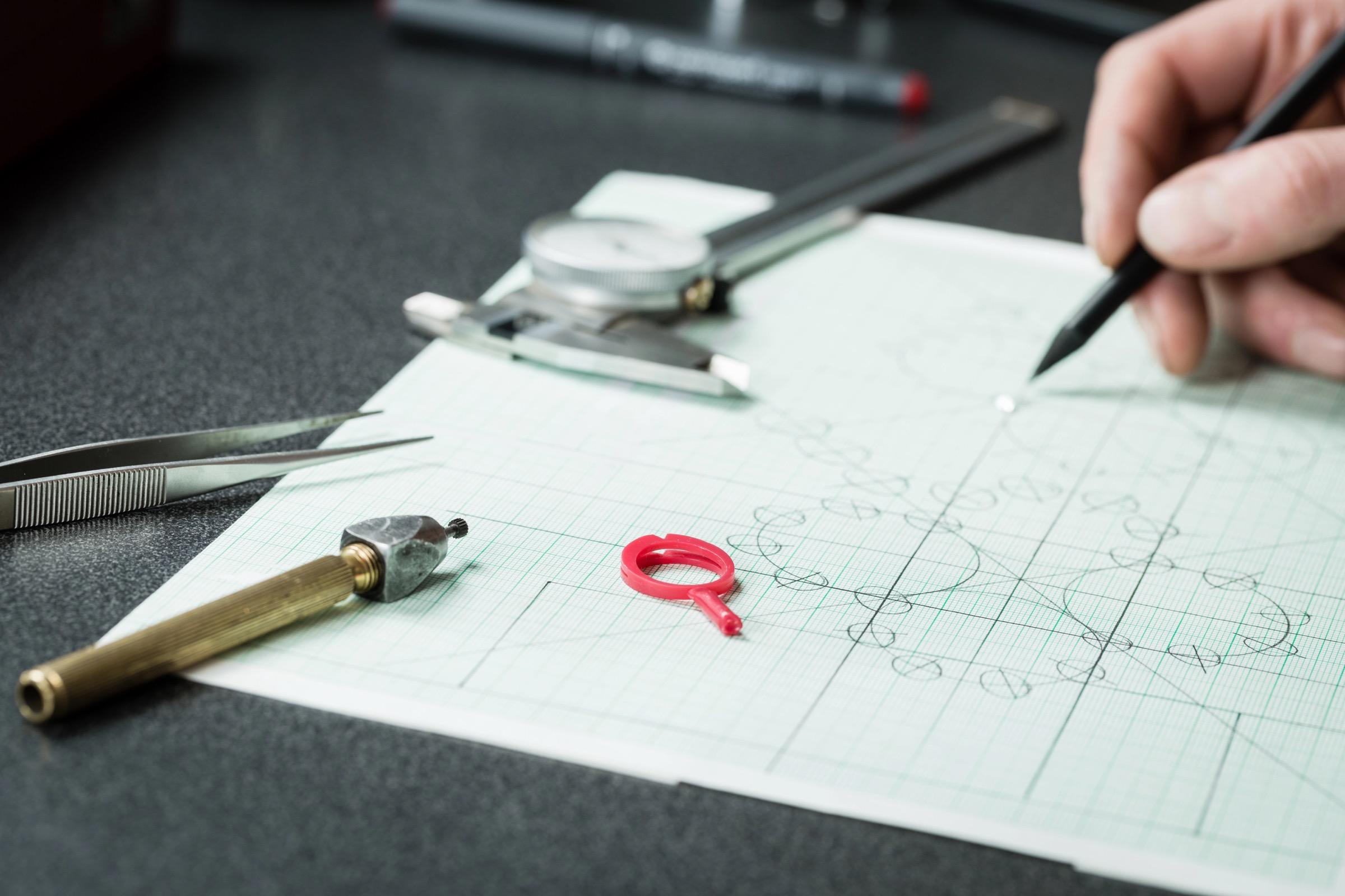 Jewellery designer at work in the workshop