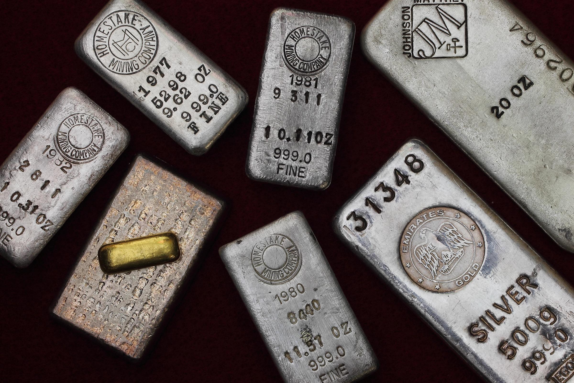 Gold and silver bullion bars — precious metal comparison