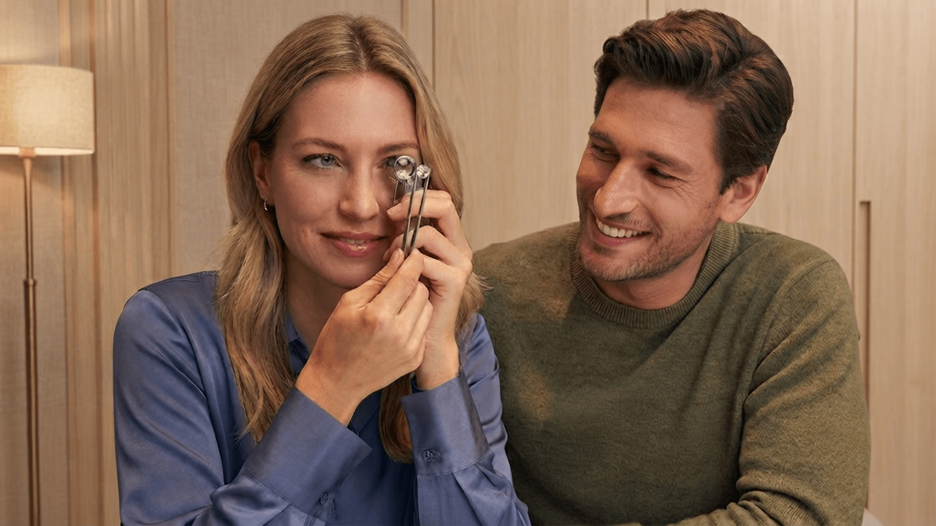 Couple examining a diamond together at the MOH London Hatton Garden showroom